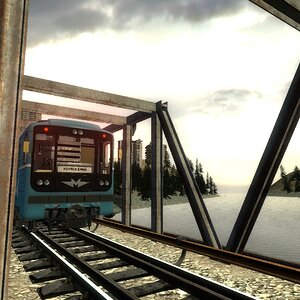 Поезд 81-717 проезжает через мост.